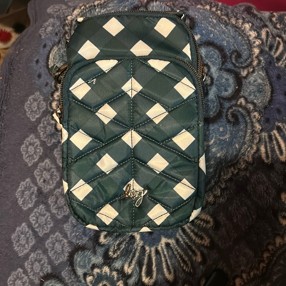 Lug skeeter mini bridge convertible crossbody bag. 3 pockets, green and white.
